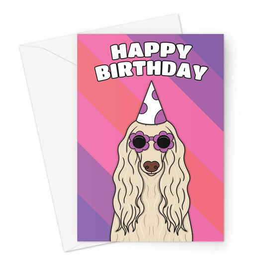 A playful and colourful birthday card featuring an adorable Afghan Hound dog wearing a party hat 
