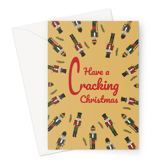 Nutcracker-themed Christmas card with the message “Have a Cracking Christmas” surrounded by festive Nutcracker soldiers and holly on a gold background.