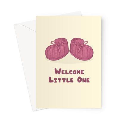 Welcome little one greeting card with illustrated pink knitted baby booties on a cream background
