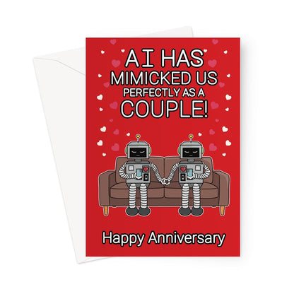 Funny anniversary card with two cute robots holding hands on a sofa, surrounded by hearts, with the caption "AI has mimicked us perfectly as a couple! Happy Anniversary" on a red background.