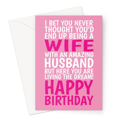 Funny pink wife birthday card from husband with bold white and pink text saying “I bet you never thought you’d end up being a wife with an amazing husband but here you are living the dream!”