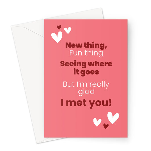 Romantic Valentine’s card with coral background and hearts featuring the text new thing fun thing seeing where it goes but I’m really glad I met you