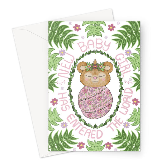 New baby girl card with hand-drawn baby bear wrapped in pink floral swaddle, surrounded by green leaves and flowers. Text reads “New Baby Girl Has Entered the World.”