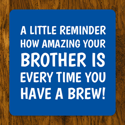 Blue coaster with white text on a wooden surface