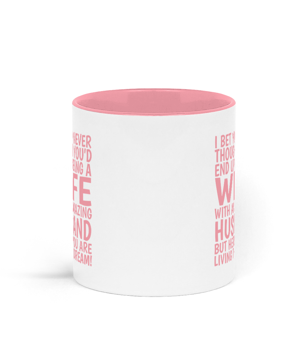 White mug with pink interior and text on a white background