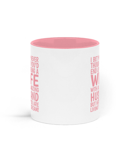 White mug with pink interior and text on a white background
