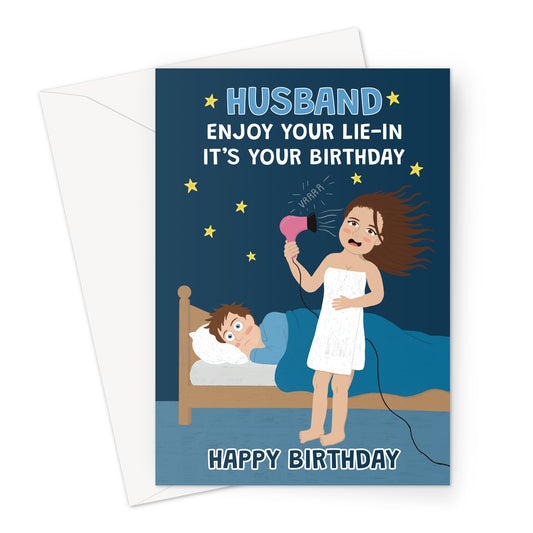 Funny husband birthday card showing a wife using a hairdryer beside her husband in bed