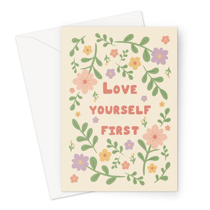 Love yourself first greeting card with pastel flowers and leaves on a cream background