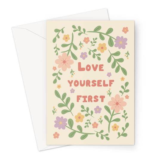 Love yourself first greeting card with pastel flowers and leaves on a cream background