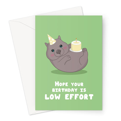 Low effort birthday card with cute illustrated animal wearing a party hat and holding a cake on a green background