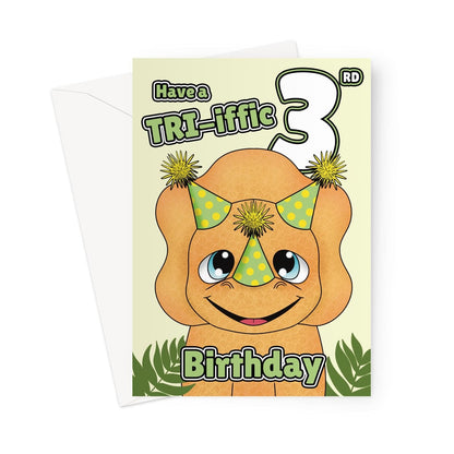 Cute 3rd birthday dinosaur card for kids with smiling triceratops in party hats and message “Have a TRI-iffic 3rd Birthday”