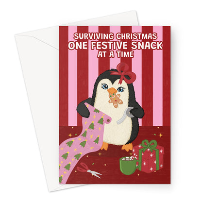 funny Christmas card with cute penguin wrapping presents and eating festive snacks
