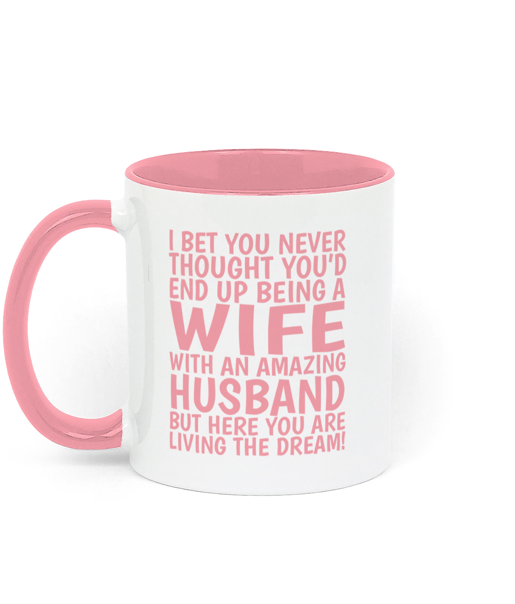 Funny wife mug from husband with pink text reading “I bet you never thought you’d end up being a wife with an amazing husband.” - Left Side