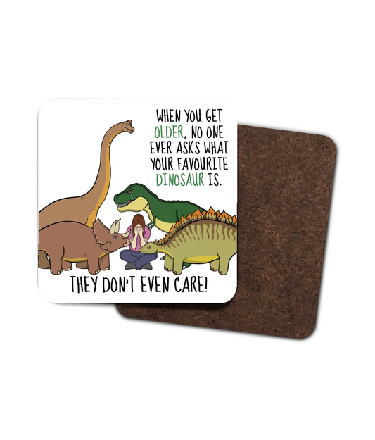 Funny dinosaur coaster featuring cartoon dinosaurs and the quote nobody asks what your favourite dinosaur is anymore