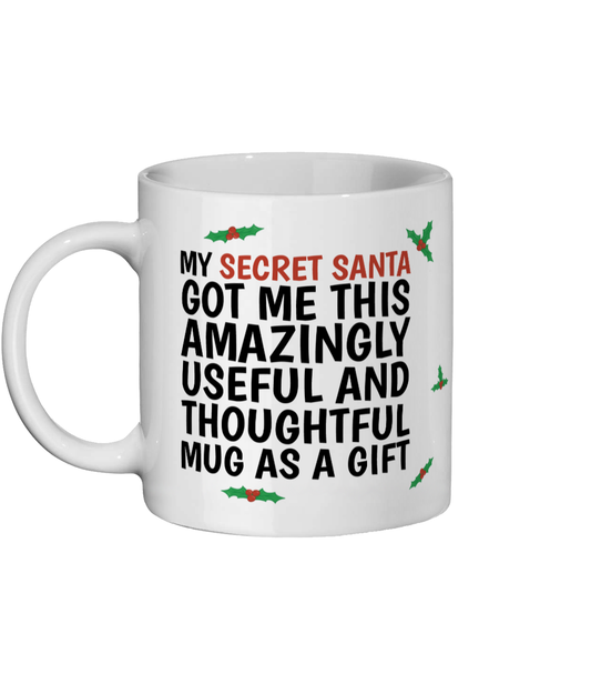 Funny Secret Santa mug with holly design and text “My Secret Santa got me this amazingly useful and thoughtful mug as a gift.” - Left Side