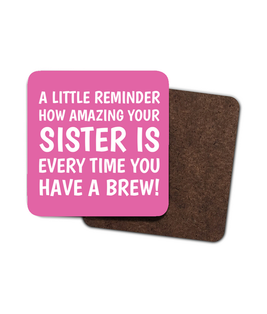 Pink coaster with the message “A little reminder how amazing your sister is every time you have a brew!” in white text.