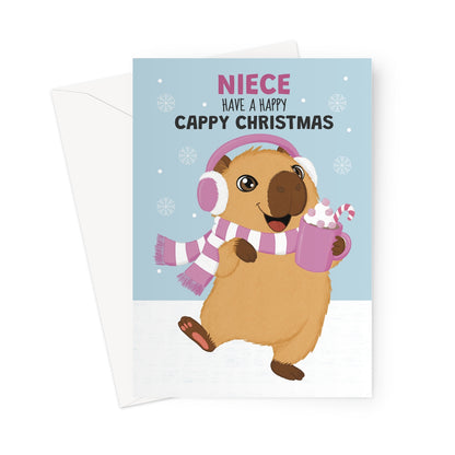 niece Christmas card with cute capybara wearing pink earmuffs and scarf holding hot chocolate